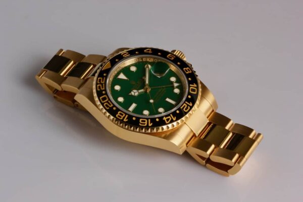 Rolex GMT Master II 18K Anniversary Edition Green Dial - Reference 116718 - SOLD